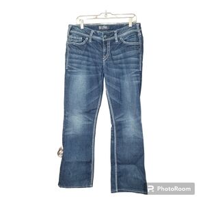 Silver Jeans Suki Flap pocket 17" flare leg medium wash distressed jeans